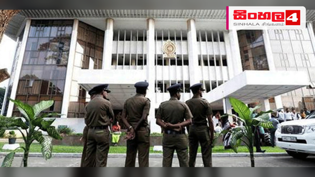 Headline: අධ්‍යාපන ප්‍රකාශන දෙපාර්තමේන්තුවේ පොත් විකිණූ පස්දෙනා රිමාන්ඩ් Intended image subject: Kaduwela Magistrate Court building Story summary: අධ්‍යාපන ප්‍රකාශන දෙපාර්තමේන්තුවට