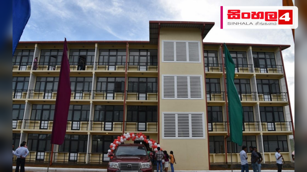 විශ්වවිද්යාල සිසුන් සඳහා නව නේවාසිකාගාර 55ක් ඉදිකිරීමේ ව්යාපෘතිය ඇරඹේ Headline: විශ්වවිද්යාල සිසුන් සඳහා නව නේවාසිකාගාර 55ක් ඉදිකිරීමේ ව්යාපෘතිය ඇරඹේ Intended image subject: Vavuniya University building Story summary: රට පුරා විශ්වවිද්යාල සිසුන්ගේ