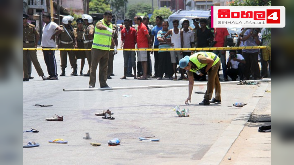 Headline: අතුරුගිරිය වෙඩි තැබීමට ආධාර අනුබල දුන් පුද්ගලයෙක් අත්අඩංගුවට Intended image subject: Sri Lanka Police officers investigating a crime scene Story summary: අතුරුගිරියේ පුද්