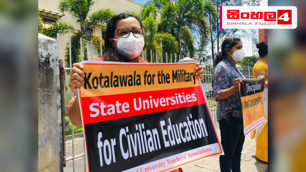 රාජ්ය විශ්වවිද්යාල ආචාර්යවරු අද විරෝධතාවක Headline: රාජ්ය විශ්වවිද්යාල ආචාර්යවරු අද විරෝධතාවක Intended image subject: University lecturers protesting Story summary: විශ්වවිද්යාල පද්ධතියේ පවතින ගැටලු සඳහා විසඳුම් නොලැබීම