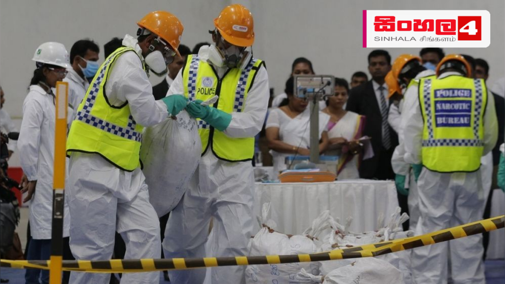 Headline: වැල්ලම්පිටියෙන් හෙරොයින් කිලෝ 12ක් සමඟ පුද්ගලයෙක් අත්අඩංගුවට Intended image subject: Police drug raid scene Story summary: වැල්ලම්පිටිය, සේදවත්ත ප්‍රදේශයේ සිදුකළ වැටලීමකද