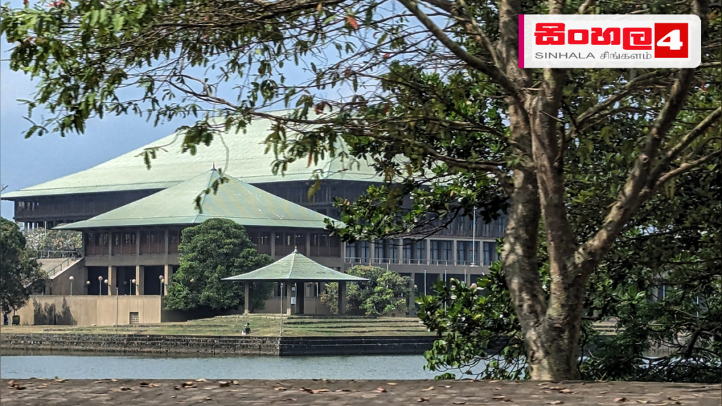 කතානායකවරයාට එරෙහි දූෂණ චෝදනා: පාර්ලිමේන්තු නිලධාරීන් අල්ලස් කොමිසම හමුවේ Headline: කතානායකවරයාට එරෙහි දූෂණ චෝදනා: පාර්ලිමේන්තු නිලධාරීන් අල්ලස් කොමිසම හමුවේ Intended image subject: Sri Lanka Parliament building exterior Story summary: කතානායක වෛද්ය ජගත