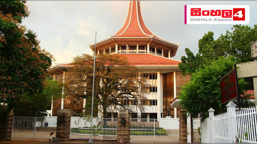 Headline: පාස්කු ප්‍රහාර නඩුවේ විත්තිකරුවන් ලිඛිත දේශන ගොනු කරයි Intended image subject: Colombo High Court building exterior Story summary: පාස්කු ඉරිදා ත්‍රස්ත ප්‍රහාර නඩුවේ විත්