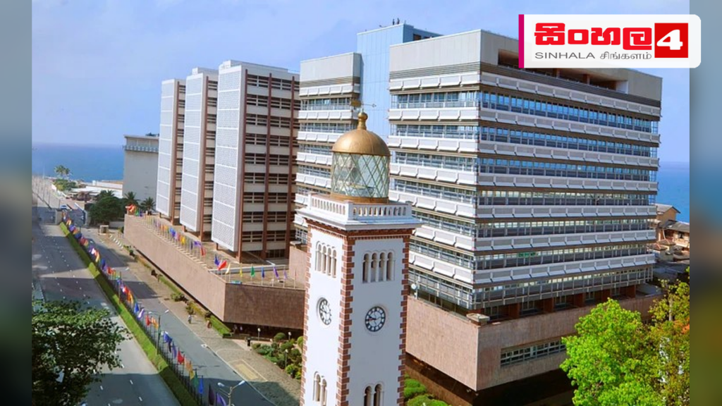 ශ්රී ලංකාවේ අයවැය පරතරය ශීඝ්රයෙන් පහළට: රජයේ ආදායම 25.1%කින් ඉහළට Headline: ශ්රී ලංකාවේ අයවැය පරතරය ශීඝ්රයෙන් පහළට: රජයේ ආදායම 25.1%කින් ඉහළට Intended image subject: Central Bank of Sri Lanka building Story summary: ශ්රී ලංකා මහ බැංකුවේ නවතම ද