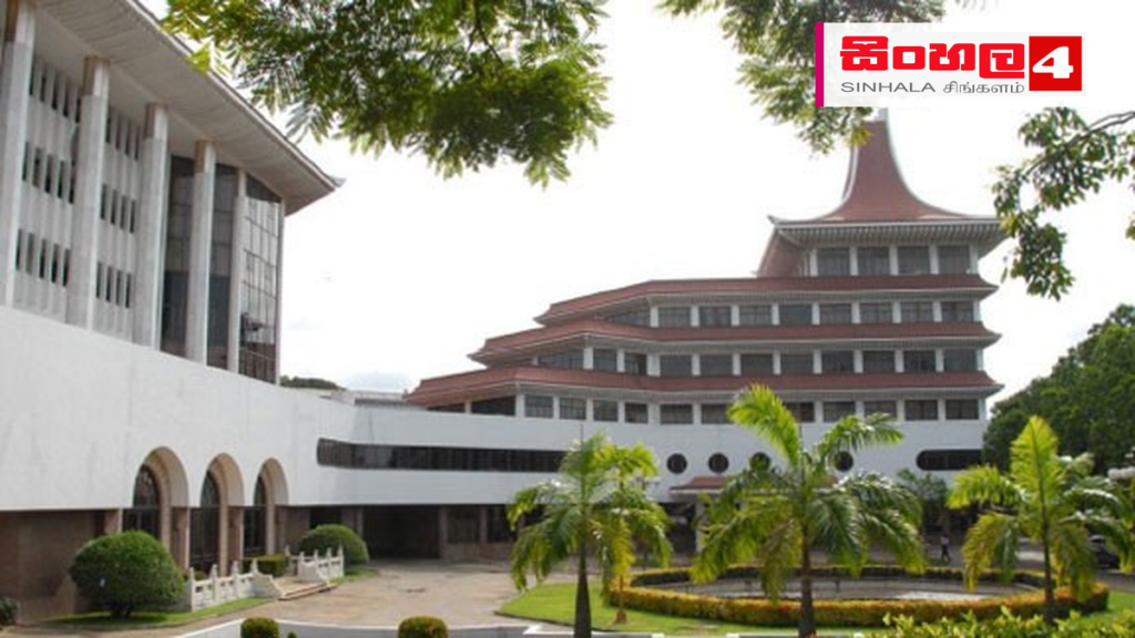 දිවුරුම් ප්රකාශ පරිවර්තක විභාගය සඳහා අයදුම්පත් කැඳවීම සහ නවතම තොරතුරු Headline: දිවුරුම් ප්රකාශ පරිවර්තක විභාගය සඳහා අයදුම්පත් කැඳවීම සහ නවතම තොරතුරු Intended image subject: Ministry of Justice Sri Lanka building Story summary: ශ්රී ලංකා අධිකරණ අමා