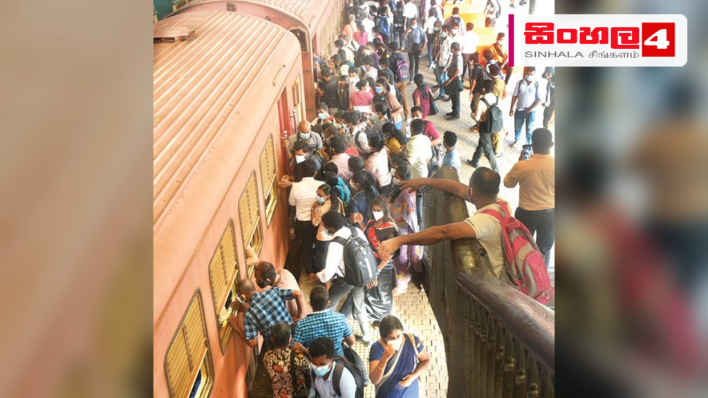 දුම්රිය වෘත්තීය සමිති ආරම්භ කළ සංකේත වැඩවර්ජනය තවදුරටත් Headline: දුම්රිය වෘත්තීය සමිති ආරම්භ කළ සංකේත වැඩවර්ජනය තවදුරටත් Intended image subject: Railway station scene with passengers Story summary: දුම්රිය සාමාන්යාධිකාරිවරයා ඉවත් කිරී