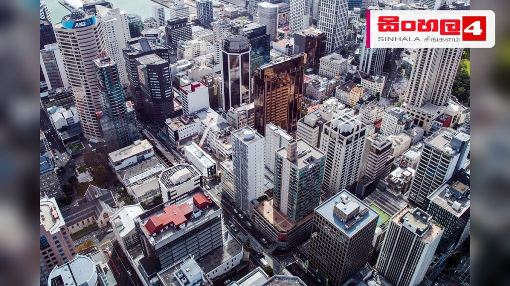 නවසීලන්තයේ ඉන්දියානු ප්රජාවට එරෙහි වෛරී ප්රකාශ ඉහළ යයි: නව වාර්තාවකින් හෙළිදරව් Headline: නවසීලන්තයේ ඉන්දියානු ප්රජාවට එරෙහි වෛරී ප්රකාශ ඉහළ යයි: නව වාර්තාවකින් හෙළිදරව් Intended image subject: New Zealand flag and Auckland city skyline Story summary: 2026 ව